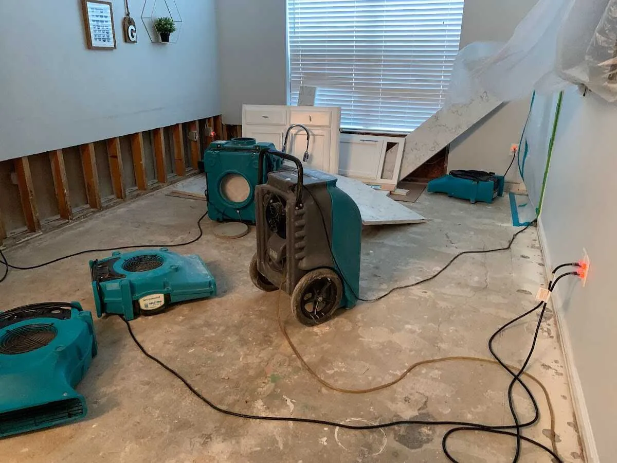 Dehumidifier in flood-cut room for Water Damage Restoration in Depew